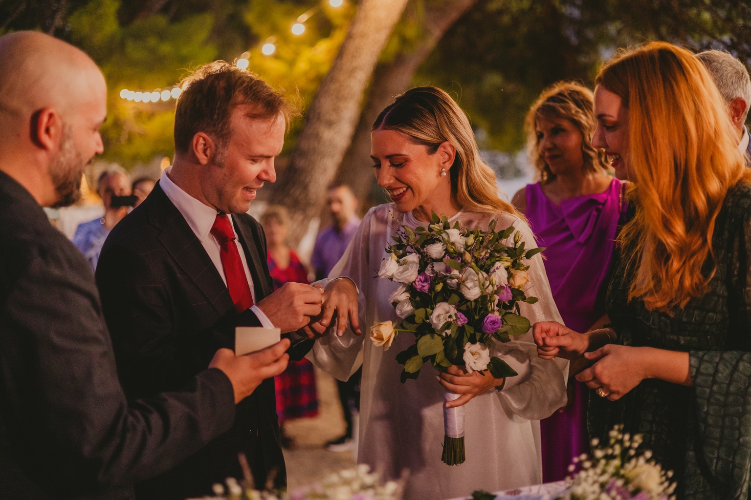 wedding couple changing rings